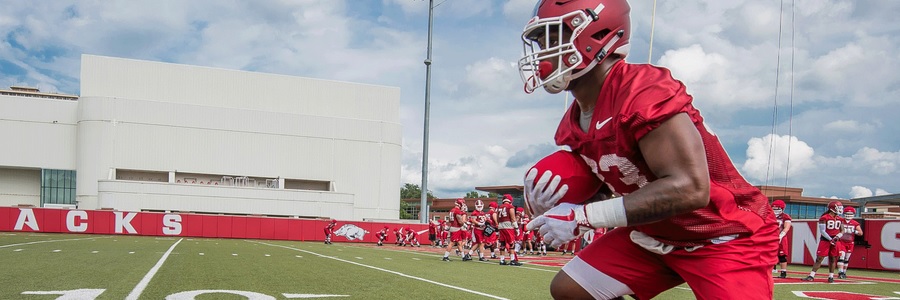 Look for the Arkansas Razorbacks to lose, but perhaps keep things close this College Football season.