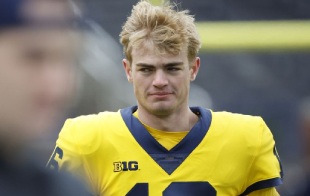 QB Davis Warren, starting quarterback for Michigan against USC Trojans