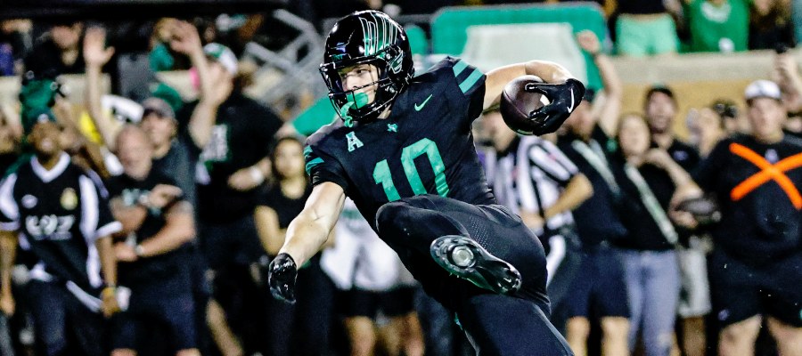 What is the Optimal Strategy for Betting Road Favorites in College Football?